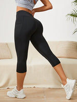 Leggings sportivi ampia fascia in vita con tasca del telefono