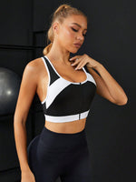 Reggiseni sportivi bicolore con zip indietro incrociato