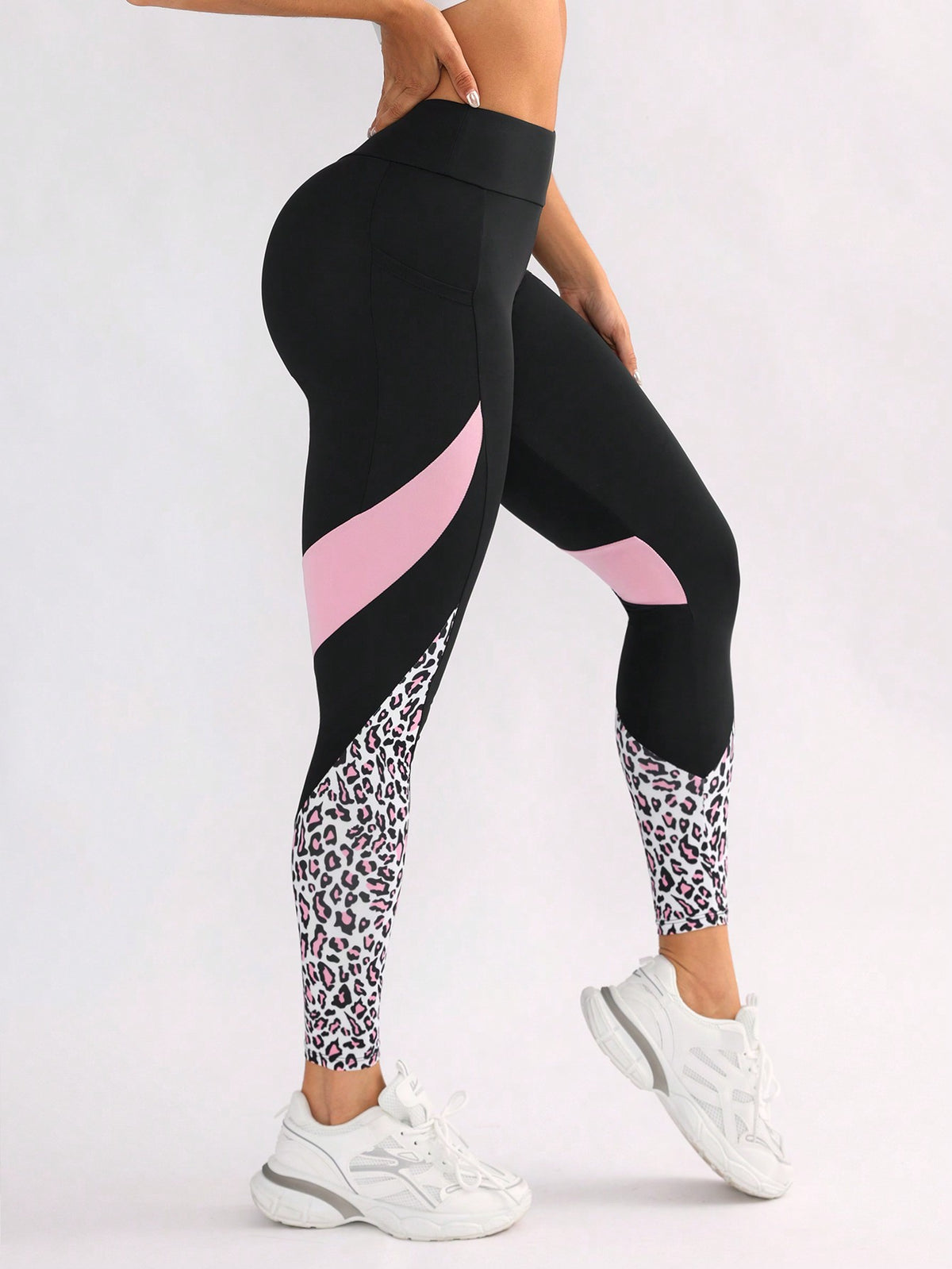 Leggings yoga a blocchi di colore con stampa leopardo e tasca per l'esercizio fisico