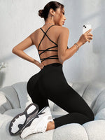 Set di abbigliamento sportivo estivo da donna, composto da top canotta con incrocio sulla schiena e leggings skinny a 7/8