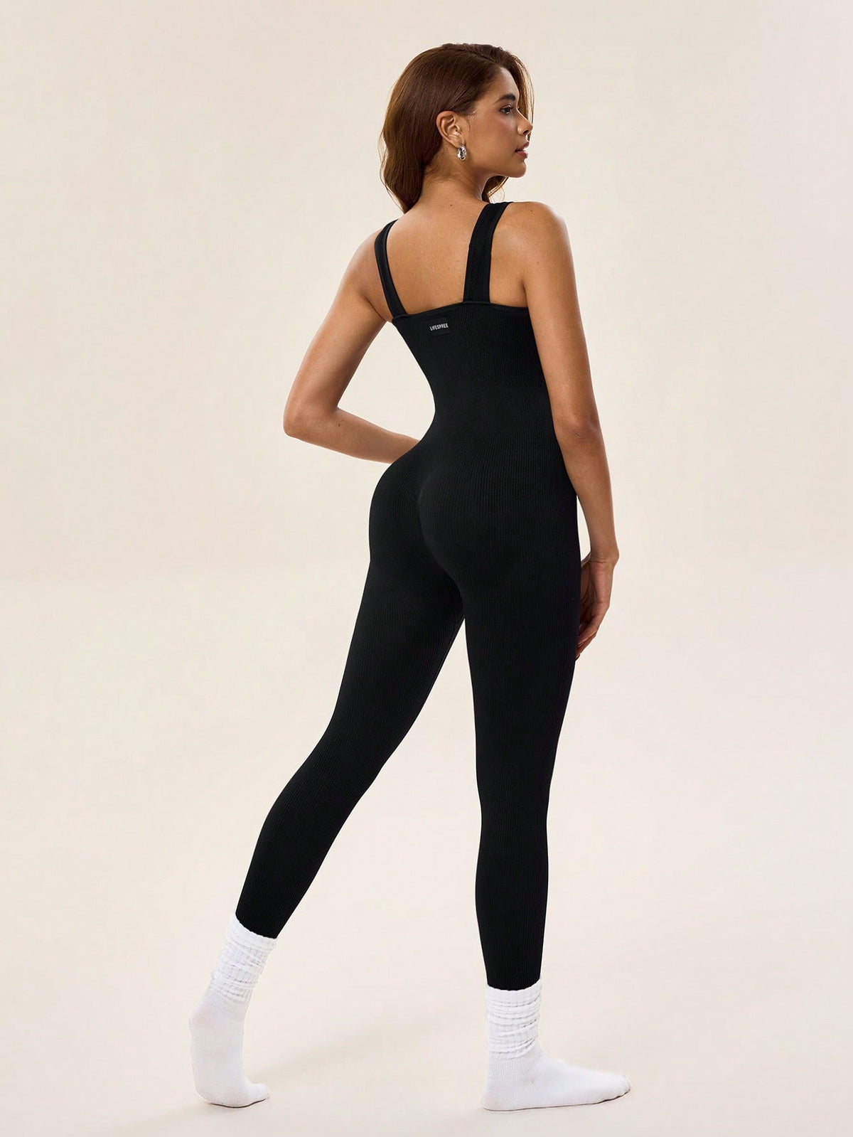 Tuta aderente sportiva senza cuciture, elastica e aderente da donna