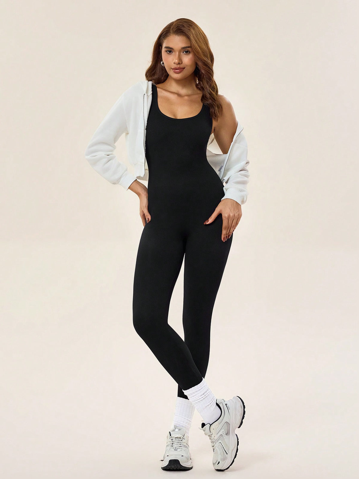 Tuta aderente sportiva senza cuciture, elastica e aderente da donna