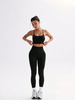 Completo sportivo casual da donna, top a bretelle e pantaloni con incrocio sulla schiena, tinta unita, minimalista