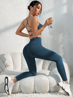 Set di abbigliamento sportivo estivo da donna, composto da top canotta con incrocio sulla schiena e leggings skinny a 7/8