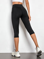 Leggings sportivi a fascia larga con tasca per telefono