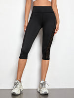 Leggings sportivi a fascia larga con tasca per telefono