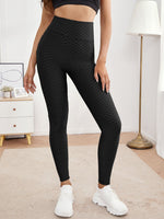 Leggings sportivi testurizzati monocolore con cintura larga