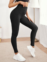 Leggings sportivi testurizzati monocolore con cintura larga