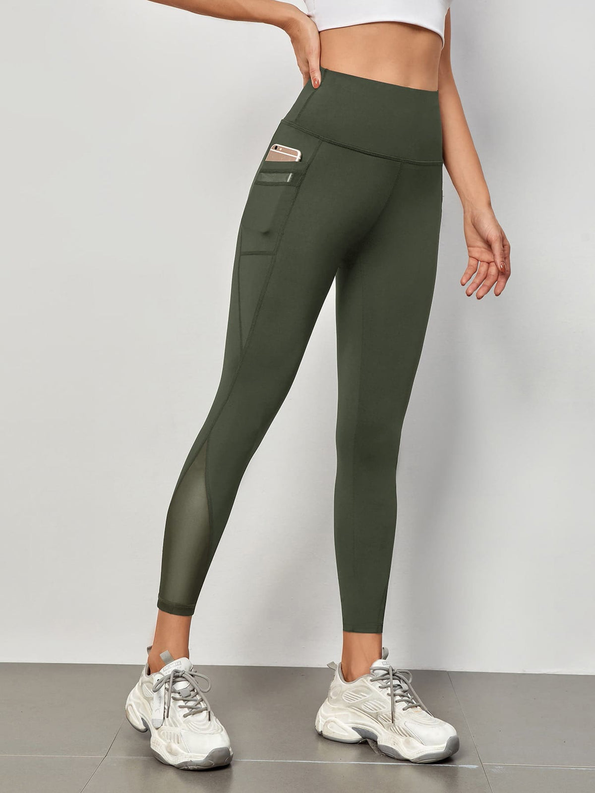 Leggings sportivi a fascia larga in maglia a contrasto con tasca per telefono