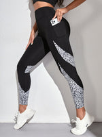 Leggings sportivi leopardato inserto in rete con tasca per telefono