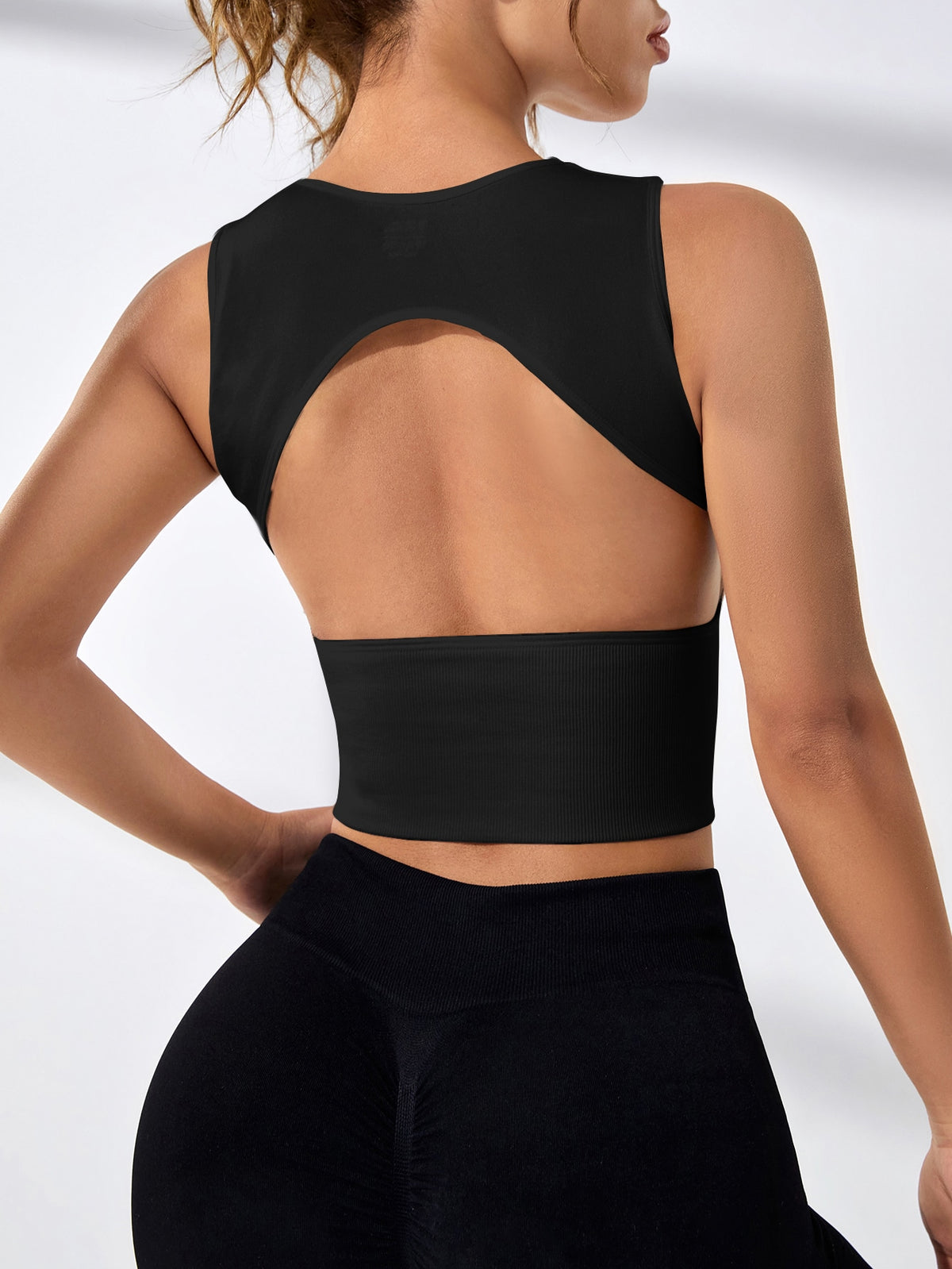 Canotta sportiva monocolore cut out indietro