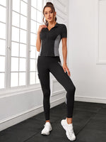 Maglietta sportiva e leggings color block con tasca del telefono