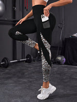 Leggings sportivi leopardato inserto in rete con tasca per telefono