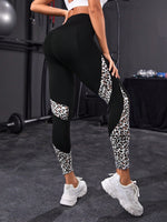 Leggings sportivi leopardato inserto in rete con tasca per telefono