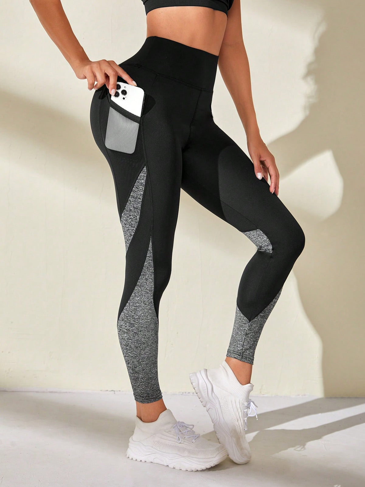 Leggings sportivi leopardato inserto in rete con tasca per telefono