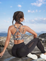 Reggiseni sportivi con stampa leopardo indietro incrociato