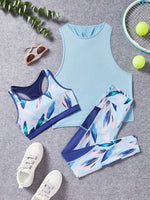 Set Di Indumenti Sportivi Da Donna Che Include Reggiseno Racerback Stampato, Leggings A Vita Alta E Top Serbatoio Con Schiena Incrociata