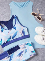 Set Di Indumenti Sportivi Da Donna Che Include Reggiseno Racerback Stampato, Leggings A Vita Alta E Top Serbatoio Con Schiena Incrociata