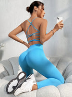 Set di abbigliamento sportivo estivo da donna, composto da top canotta con incrocio sulla schiena e leggings skinny a 7/8