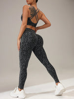 Tuta sportiva da donna senza cuciture ed elastica con stampa leopardata