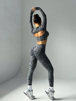 Tuta sportiva a maniche lunghe con stampa leopardata senza cuciture