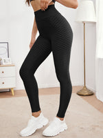 Leggings sportivi testurizzati monocolore con cintura larga