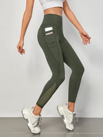 Leggings sportivi a fascia larga in maglia a contrasto con tasca per telefono