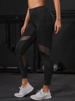 Leggings da yoga corti Collant da palestra in rete a contrasto con controllo di pancia con tasca laterale per telefono