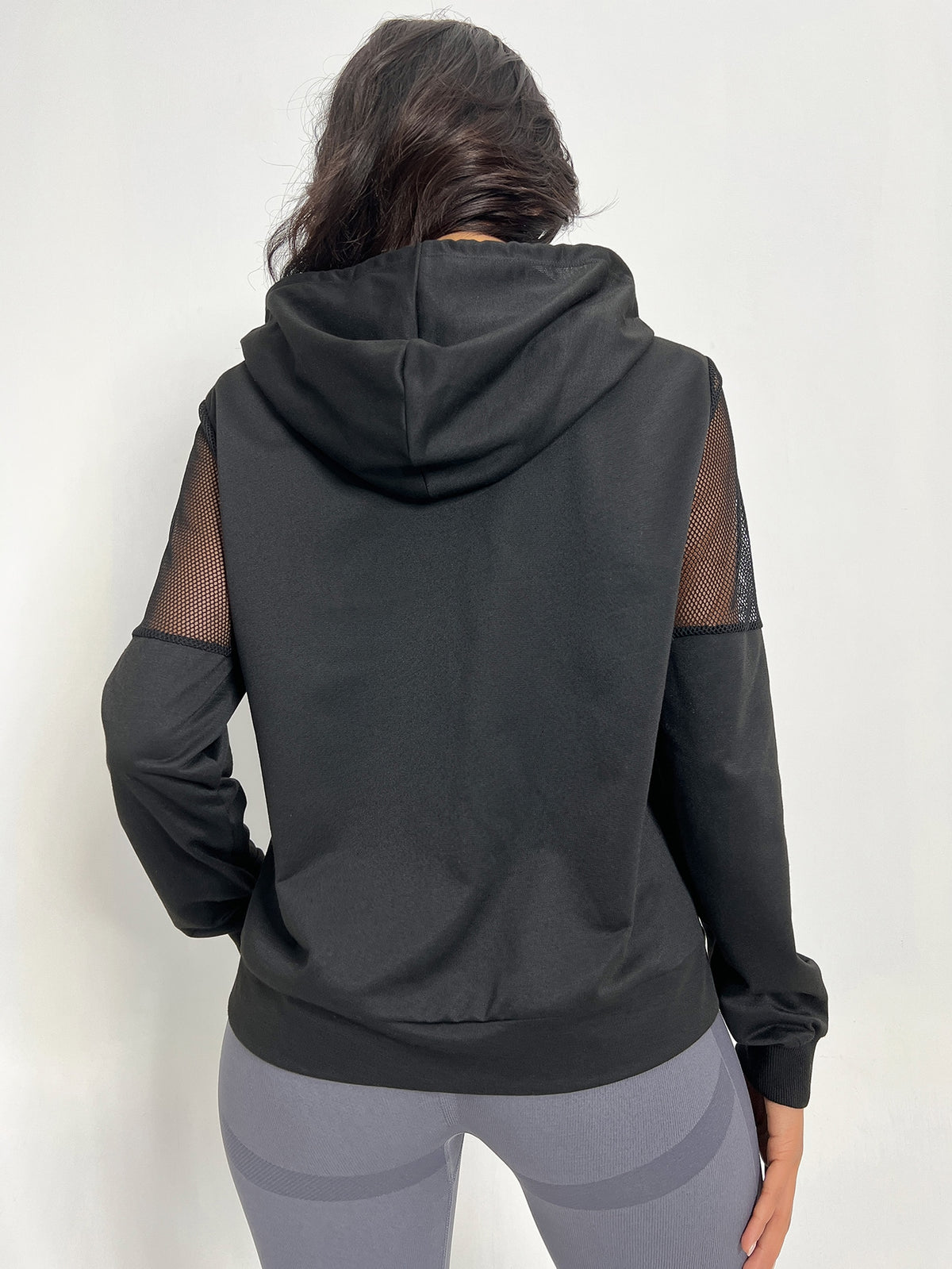 Giacche sportive in maglia a contrasto con coulisse con cappuccio