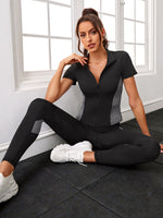 Maglietta sportiva e leggings color block con tasca del telefono