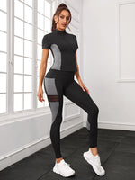 Maglietta sportiva e leggings color block con tasca del telefono