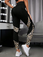 Leggings sportivi leopardato inserto in rete con tasca per telefono