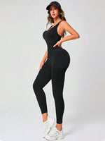 Jumpsuit sportiva schienale incrociato monocolore