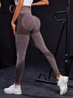 Leggings sportivi senza cuciture elasticità alta ampia fascia in vita